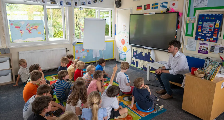 A Primary PGCE student teaching on placement at a primary school.
