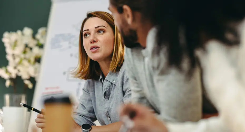 Two apprentices having a discussion during a study session