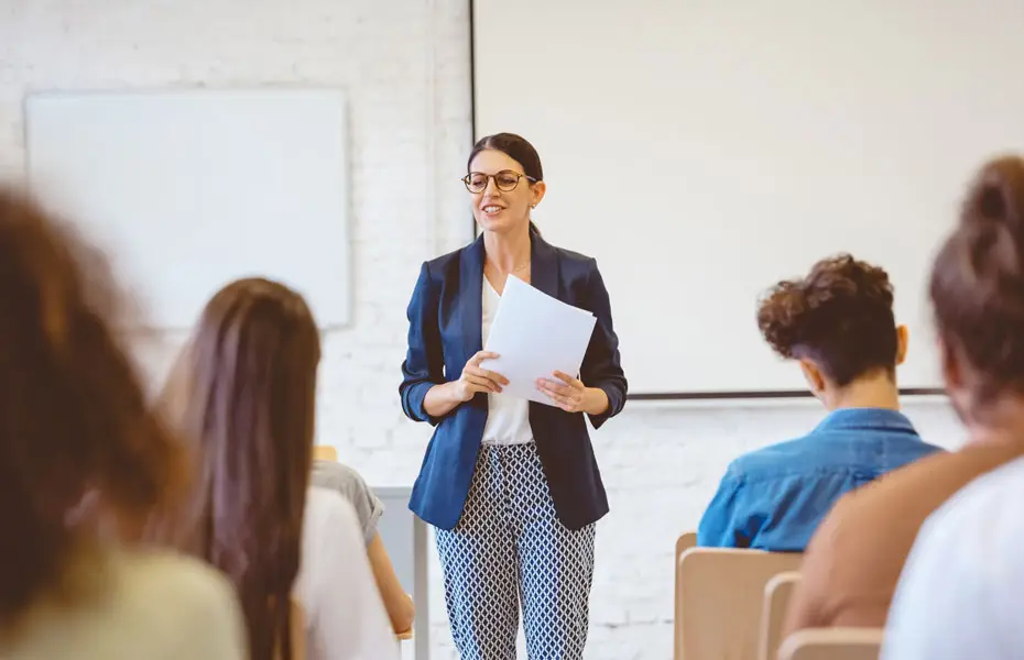 Degree Apprenticeships teacher standing at the front of a classroom of apprentices