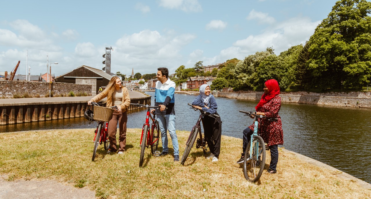 Shot of students taking a bike ride to the Double Locks pub at the Exeter Quayside.