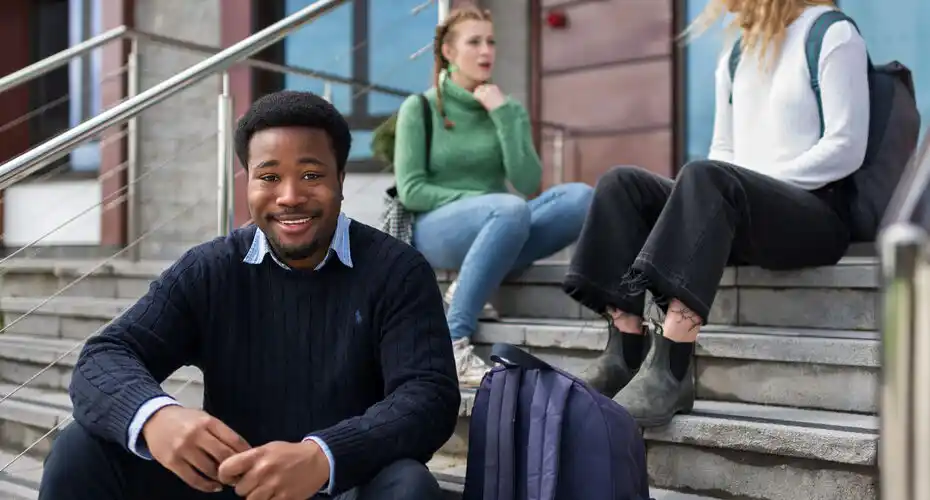 Students having a discussion on Exeter's Penryn campus