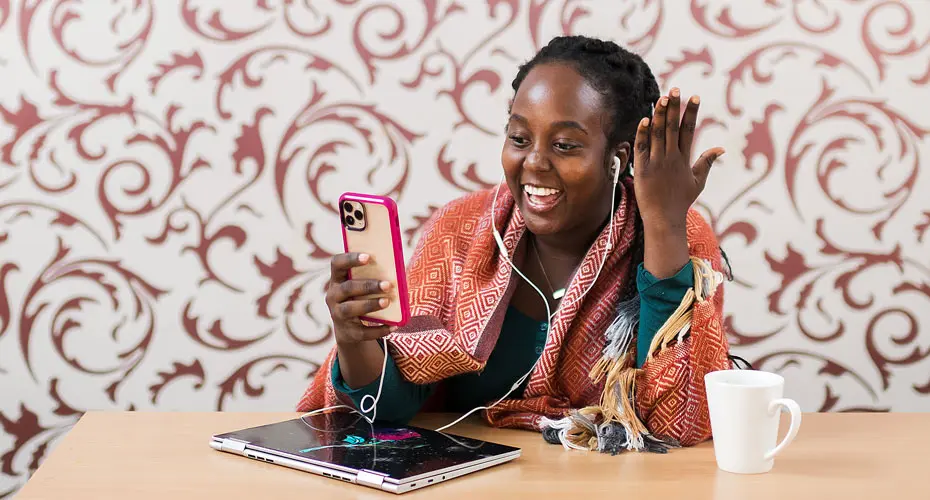 A student having a conversation on their phone.