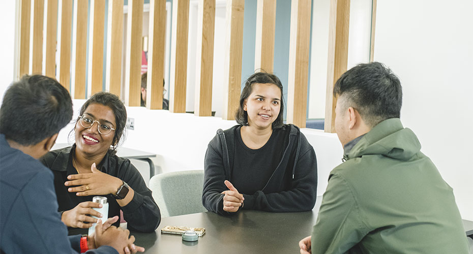 Students meeting in an informal meeting space