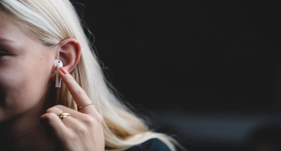 Person listening to headphones