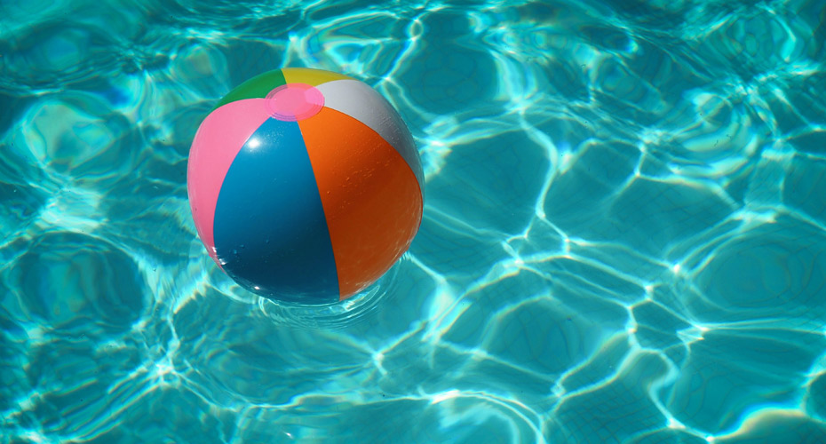 Beach ball in swimming pool