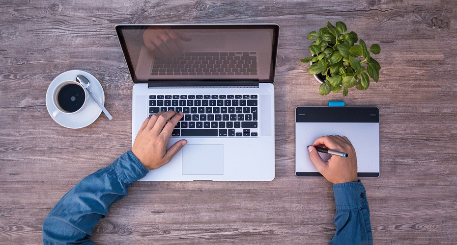 aerial shot of someone working on a laptop