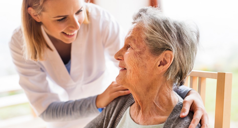 Elderly woman and nurse 