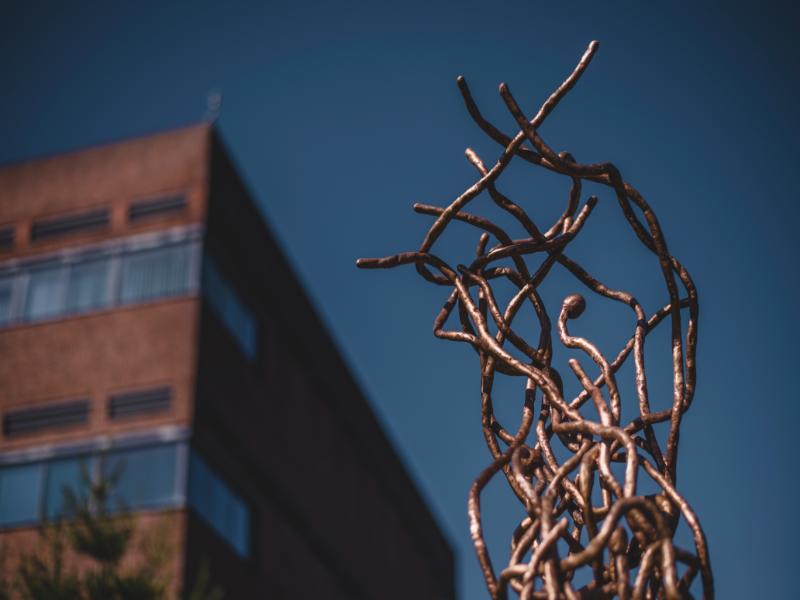 Top of the Pharmakon sculpture with Geoffrey Pope building visible