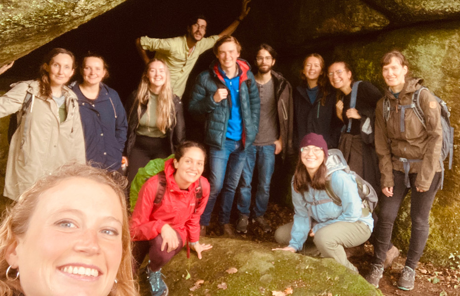 Delphine and some of her research team in the mouth of a cave