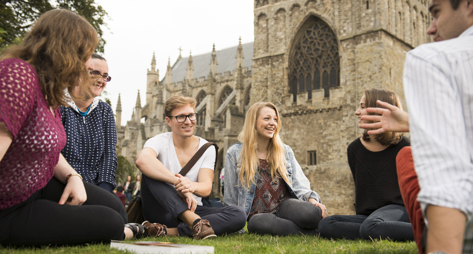 Students in front of exeter cathedral.